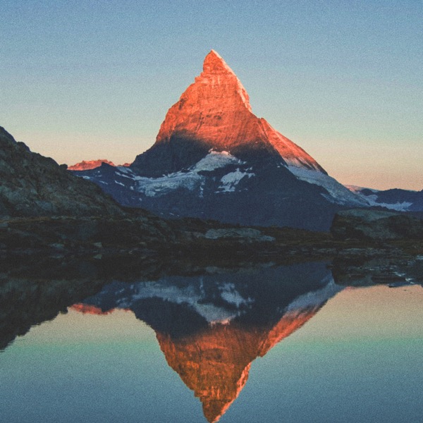 Gabriel Barreto’s avatar: a sunlit mountain reflected in a still alpine lake
